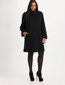 A streamlined silhouette with a mandarin collar. Mandarin collar with button detail Long sleeves Concealed front button closure Slash pockets About 35½ from shoulder to hem Fully lined 60% wool/20% angora/20% nylon Dry clean Made in Italy A streamlined silhouette with a mandarin collar. Mandarin collar with button detail Long sleeves Concealed front button closure Slash pockets About 35½ from shoulder to hem Fully lined 60% wool/20% angora/20% nylon Dry clean Made in Italy