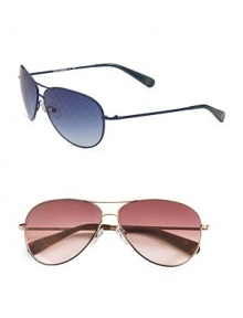 A new take on a classic style. Coated lens sprinkled with allover Tory logo pattern. Available in blue with blue lens or gold with brown lens. Metal UV 400 lens 100% UV protection Imported A new take on a classic style. Coated lens sprinkled with allover Tory logo pattern. Available in blue with blue lens or gold with brown lens. Metal UV 400 lens 100% UV protection Imported