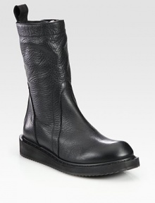 Pebbled leather, mid-calf style with a side zipper, rubber sole and extended pull tab. Rubber wedge, 1 (25mm)Rubber platform, ½ (15mm)Compares to a ½ heel (15mm)Shaft, 10Leg circumference, 12Leather upperSide zipperLeather liningRubber solePadded insoleMade in Italy