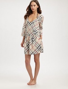 A breezy design with an equally laid-back fit make this check coverup perfect. Deep v-neckThree-quarter sleevesDrop waistRelaxed fitCottonMachine washImported