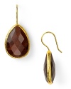 Make every look dazzle with Coralia Leets' striking tiger's eye teardrops. These 22-karat gold-rimmed earrings look effortless paired with slinky knits or something cocktail dressier.