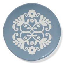 A decorative pattern adorns this versatile salad plate, perfect for a medley of greens or a selection of juicy fruits. A decorative pattern adorns this versatile salad plate, perfect for a medley of greens or a selection of juicy fruits.