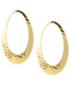 Shapely style. This pair of oval drop earrings from Robert Lee Morris is crafted from gold-tone mixed metal and has a textured feel. Approximate drop: 2-3/4 inches.