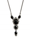 Pendant perfection. The Y silhouette of this glamorous Givenchy necklace yields a distinguished decorative detail. Featuring jet and black glass accents, it's crafted in hematite tone mixed metal. Approximate length: 16 inches + 2-inch extender. Approximate drop: 1 inch.