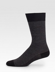 A stylish combination of jacquard and houndstooth adds charming appeal to these wool socks with a touch of stretch.Mid-calf height80% virgin wool/20% polyamideMachine washMade in Italy A stylish combination of jacquard and houndstooth adds charming appeal to these wool socks with a touch of stretch.Mid-calf height80% virgin wool/20% polyamideMachine washMade in Italy
