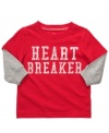 Love at first sight. No one will be able to resist your little prince, even if he warns them first with this graphic shirt from Carter's.