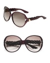 A round-shaped frame with pretty, braided temples. Available in black with grey gradient lens or pearl violet with brown gradient lens. Metal accented, braided temples100% UV protectionMade in Italy