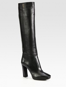 Tall leather silhouette with a square toe, stacked platform heel and side zip. Self-covered heel, 4 (100mm)Self-covered platform, ½ (15mm)Compares to a 3½ heel, (90mm)Shaft, 17Leg circumference, 14½Leather upperSide zipLeather liningRubber solePadded insoleMade in Italy