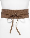 Finish flouncy dresses and pleated skirts with this stunning Eileen Fisher belt.