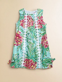 Vibrant florals on pure cotton, accented with lace and bow accents. JewelneckSleevelessTwo bands of lace down the center frontSide bows on the hemBack zipperCottonFully linedMachine washImported Vibrant florals on pure cotton, accented with lace and bow accents. JewelneckSleevelessTwo bands of lace down the center frontSide bows on the hemBack zipperCottonFully linedMachine washImported