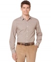 Look sharp in this slim fit plaid button down by Perry Ellis.