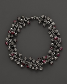 Inspired by Zen philosophy, this intricately detailed sterling silver bracelet from Paul Morelli softly jingles with meditation bells and cabochons of pink rhodalite. Inspired by Zen philosophy, this intricately detailed sterling silver bracelet from Paul Morelli softly jingles with meditation bells and cabochons of pink rhodalite.