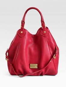 A shapely update of a classic tote in fine pebble-textured leather with soft pleats at the bottom and a golden signature plaque.Double top handles, 7½ dropAdjustable detachable shoulder strap, 16½-18 dropSnap closeOne inside zip pocket and two inside open pocketsPrint cotton lining19½W X 14H X 4½DImportedPlease note: hardware color may vary. A shapely update of a classic tote in fine pebble-textured leather with soft pleats at the bottom and a golden signature plaque.Double top handles, 7½ dropAdjustable detachable shoulder strap, 16½-18 dropSnap closeOne inside zip pocket and two inside open pocketsPrint cotton lining19½W X 14H X 4½DImportedPlease note: hardware color may vary.