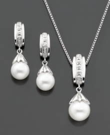 The perfect pairing. This matching set features a graceful pendant and pair of stud earrings that highlight a cultured freshwater pearl (7-8 mm) with round-cut diamond accents for a classic touch. Set in sterling silver. Approximate chain length: 18 inches. Approximate pendant drop: 1/2 inch. The perfect pairing. This matching set features a graceful pendant and pair of stud earrings that highlight a cultured freshwater pearl (7-8 mm) with round-cut diamond accents for a classic touch. Set in sterling silver. Approximate chain length: 18 inches. Approximate pendant drop: 1/2 inch.