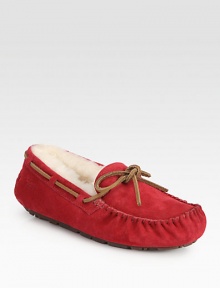 Moccasin-inspired suede style with leather trim and shearling lining for ultimate comfort. Suede upper Shearling lining Rubber sole Padded insole ImportedOUR FIT MODEL RECOMMENDS ordering true whole size; ½ sizes should order the next whole size up. Moccasin-inspired suede style with leather trim and shearling lining for ultimate comfort. Suede upper Shearling lining Rubber sole Padded insole ImportedOUR FIT MODEL RECOMMENDS ordering true whole size; ½ sizes should order the next whole size up.