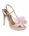 Oversized flowers make these pumps so pretty. Badgley Mischka's Zabrina platform sandals feature a sexy slingback ankle strap with a side buckle.