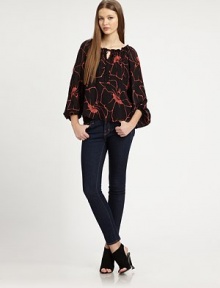 Silhouetted florals elevate this dreamy blouson blouse crafted from gorgeous silk georgette.Gathered scoopneckTie-front keyholeGathered sleevesFlared hemAbout 26 from shoulder to hemSilkDry cleanImportedModel shown is 5'10 (177cm) wearing US size Small. Silhouetted florals elevate this dreamy blouson blouse crafted from gorgeous silk georgette.Gathered scoopneckTie-front keyholeGathered sleevesFlared hemAbout 26 from shoulder to hemSilkDry cleanImportedModel shown is 5'10 (177cm) wearing US size Small.