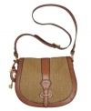 A lush carryall with a classic girl-meets-boy look. You'll fall in love with this textured cotton and rich leather Vintage Re-Issue flap bag by Fossil.