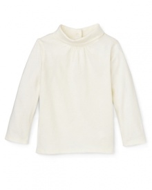 Perfect for layering under dresses and sweaters, this cozy Pearls & Popcorn mock turtleneck with peach finishing is the ultimate winter warmth. Perfect for layering under dresses and sweaters, this cozy Pearls & Popcorn mock turtleneck with peach finishing is the ultimate winter warmth.