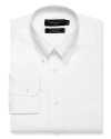 Long sleeve dress shirt with point, button down collar. Single needle tailoring, angle cut barrel cuffs with two buttons to resize width. Chest pocket. Textured solid white.