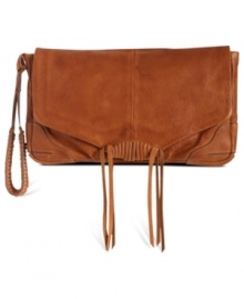 Laid-back with a veritable '70s vibe, this Jordana clutch from Lucky Brand has haute hippie-chic allure. Crafted from the softest suede with a companion wristlet strap, it's perfectly sized for any day-to-night dalliances. Laid-back with a veritable '70s vibe, this Jordana clutch from Lucky Brand has haute hippie-chic allure. Crafted from the softest suede with a companion wristlet strap, it's perfectly sized for any day-to-night dalliances.