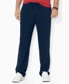 A classic-fitting drawstring pant in soft ribbed cotton is designed for casual comfort and style.