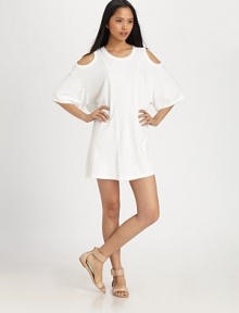 Soft jersey knit with the alluring accent of cutout shoulders.Scoop necklineElbow-length sleevesSlightly flared silhouetteAbout 14 from natural waist48% Supima cotton/48% micro modal/4% spandexDry cleanMade in USA