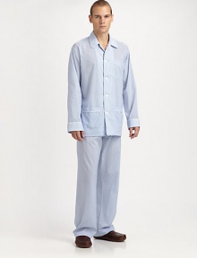 Lounge around all night and day in this luxuriously soft cotton two-piece set with piping for a classic feel. Machine wash. Imported.SHIRTButtonfrontSpread collarChest, waist patch pocketsPANTSFlat-front styleAdjustable two-button waistSide elastic waist insetsNo flyInseam, about 31 Lounge around all night and day in this luxuriously soft cotton two-piece set with piping for a classic feel. Machine wash. Imported.SHIRTButtonfrontSpread collarChest, waist patch pocketsPANTSFlat-front styleAdjustable two-button waistSide elastic waist insetsNo flyInseam, about 31