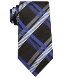 This cool patterned tie from Geoffrey Beene slims down to pair perfectly with your fitted shirt collection. This cool patterned tie from Geoffrey Beene slims down to pair perfectly with your fitted shirt collection.