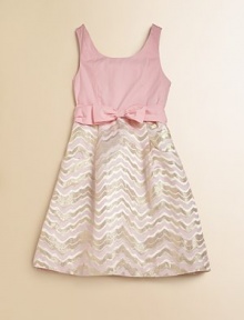 A full skirt with wavy metallic detail and a cinched, bow and sash waistline define this elegant frock.ScoopneckSleevelessBack zipperWaistband sash with bowFlat front pocketsFull skirtCottonMachine washImported A full skirt with wavy metallic detail and a cinched, bow and sash waistline define this elegant frock.ScoopneckSleevelessBack zipperWaistband sash with bowFlat front pocketsFull skirtCottonMachine washImported