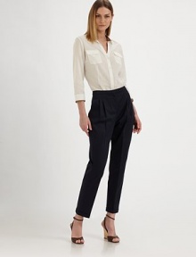 This cropped, crisply pleated design is impeccably tailored for a flattering fit.Self waistband with belt loops and back notchZip fly with hook-and-bar closureFront pleatsCuffed legBack button welt pocketsInseam, about 2766% linen/32% cotton/2% elastaneDry cleanMade in Italy of imported fabricModel shown is 5'9½ (176cm) wearing US size 4.OUR FIT MODEL RECOMMENDS ordering true size. 