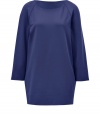 Quietly elegant and preppy-polished, Jil Sanders navy mini-dress ups the ante on minimalist chic - Straight, slightly boxy silhouette tapers slightly through hips - Flattering round neck and 3/4 raglan-style sleeves - Longer cut hits mid thigh, hem hangs longer in the back - Pair with pencil skirts, cigarette pants or slim-cut trousers