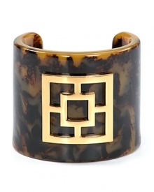 Trina Turk's tortoiseshell cuff captures ladylike sophistication while the gold plated emblem makes it bombshell bold. Trina Turk's tortoiseshell cuff captures ladylike sophistication while the gold plated emblem makes it bombshell bold.