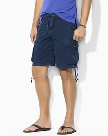 Crafted from durable cotton poplin, the essential classic-fitting Jump cargo short channels rugged military style with utility details. Crafted from durable cotton poplin, the essential classic-fitting Jump cargo short channels rugged military style with utility details.