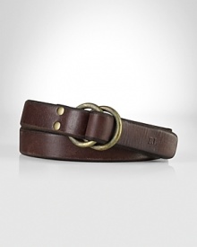 A nod to vintage workwear, this burnished leather belt features an oxidized brass double-ring closure for vintage appeal. A nod to vintage workwear, this burnished leather belt features an oxidized brass double-ring closure for vintage appeal.