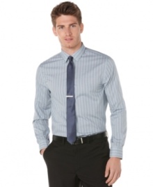 Slim down your business look with this modern trimmed dobby stripe shirt from Perry Ellis.