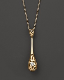 From the Mauresque collection, a teardrop lace-inspired pendant in 18 Kt. yellow gold with diamond pavé. With signature ruby accent. Designed by Roberto Coin. From the Mauresque collection, a teardrop lace-inspired pendant in 18 Kt. yellow gold with diamond pavé. With signature ruby accent. Designed by Roberto Coin.