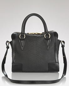 This embossed leather bag from Pour La Victoire takes the satchel to exotic extremes. Whether you're carrying on or simply in need of a cool carryall, this sizable style is wildly chic. This embossed leather bag from Pour La Victoire takes the satchel to exotic extremes. Whether you're carrying on or simply in need of a cool carryall, this sizable style is wildly chic.