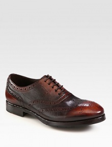 A smart, confident style that transitions easily from office to weekend wear, constructed in burnished leather with impeccable perforated detail for heritage-appeal.Leather upperLeather liningLeather/rubber soleMade in Italy A smart, confident style that transitions easily from office to weekend wear, constructed in burnished leather with impeccable perforated detail for heritage-appeal.Leather upperLeather liningLeather/rubber soleMade in Italy