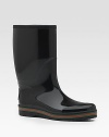 Rubber rain boot with signature trim and interlocking G on back. Rubber sole. Made in Italy. Please note: For best fit please size down one full size.