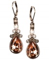 Complement your seasonal looks with these neutral-hued drops from Givenchy. With a brown gold tint, crystal accents are highlighted in a drop silhouette. Crafted in brown gold tone mixed metal. Approximate drop: 1-7/8 inches.