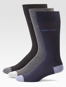 Lightweight and breathable solid dress socks with logo detail and heel and toe contrast, finished in a smooth, stretch cotton blend.Set of 3Mid-calf height75% cotton/23% polyesteramide/2% elastaneMachine washImported Lightweight and breathable solid dress socks with logo detail and heel and toe contrast, finished in a smooth, stretch cotton blend.Set of 3Mid-calf height75% cotton/23% polyesteramide/2% elastaneMachine washImported