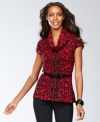 Purr-fectly adorable, this petite sweater from INC mixes animal print, bold color and tops it all off with bow belt.