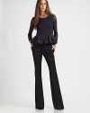 Finespun Italian wool, in a flattering wide-leg silhouette.Self waistband with belt loopsZip fly with hook-and-bar closureSide slash pocketsBack button welt pocketsSilk liningInseam, about 3593% polyamide/7% elastaneDry cleanMade in ItalyModel shown is 5'9½ (176cm) wearing US size 4. 