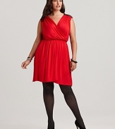 Exposed zippers put an edgy twist on this Love Ady dress, boasting a flattering faux wrap silhouette in a fiery red hue.