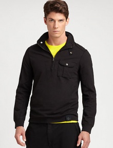 Sleeve pockets and ventilating grommets lend a sporty weekend favorite a subtle utilitarian feel in a soft cotton terry construction.Half-zip frontStand collarChest flap pocketCottonMachine washImported Sleeve pockets and ventilating grommets lend a sporty weekend favorite a subtle utilitarian feel in a soft cotton terry construction.Half-zip frontStand collarChest flap pocketCottonMachine washImported