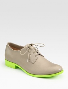 A lace-up leather must-have with a contrasting sole and slight heel. Stacked heel, 1 (25mm)Leather upperLeather lining and solePadded insoleMade in Italy A lace-up leather must-have with a contrasting sole and slight heel. Stacked heel, 1 (25mm)Leather upperLeather lining and solePadded insoleMade in Italy