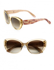 Retro-inspired frames in lightweight acetate and polarized frames. Available in champagne with brown polarized lens. Logo temples100% UV protectionImported Retro-inspired frames in lightweight acetate and polarized frames. Available in champagne with brown polarized lens. Logo temples100% UV protectionImported