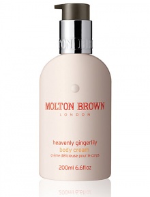 Our Heavenly Gingerlily Body Cream is a true original product in every way, using the finest essential oils and active extracts, it bring the flavors and aromas of the Polynesian islands to life. The indulgent body lotion will leave your skin not only feeling hydrated and moisturized, but mica extract leaves the skin with a sheen of shimmer which is visible after application. Perfect for holiday or going out. Made in England. 6.6 oz. Our Heavenly Gingerlily Body Cream is a true original product in every way, using the finest essential oils and active extracts, it bring the flavors and aromas of the Polynesian islands to life. The indulgent body lotion will leave your skin not only feeling hydrated and moisturized, but mica extract leaves the skin with a sheen of shimmer which is visible after application. Perfect for holiday or going out. Made in England. 6.6 oz.