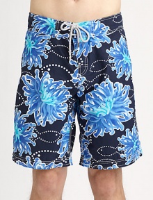 A sea-inspired print full of color and charm accents these classic-fitting swim trunks, in quick-drying nylon, for superior comfort and style.Drawstring waistInseam, about 10PolyamideMachine washImported